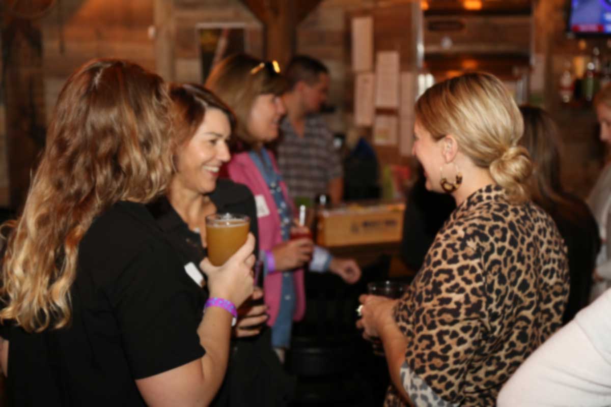 Networking Event, young professionals chat and have a drink.