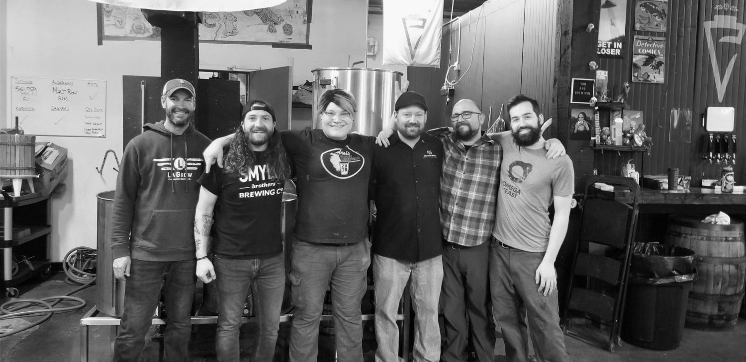 A group photo of some of the brewers that worked on All Together Now