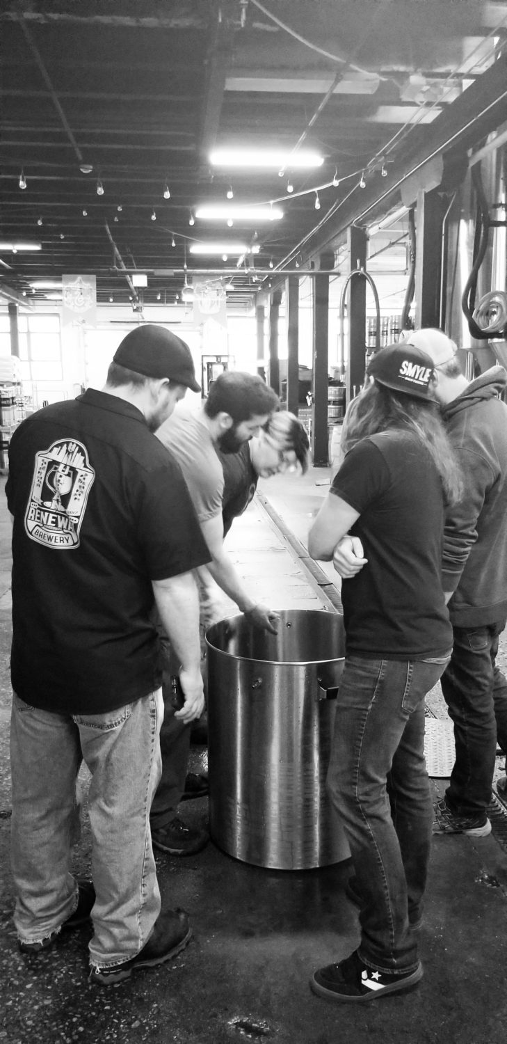 A group of Malt Row brewers brewing All Together Now