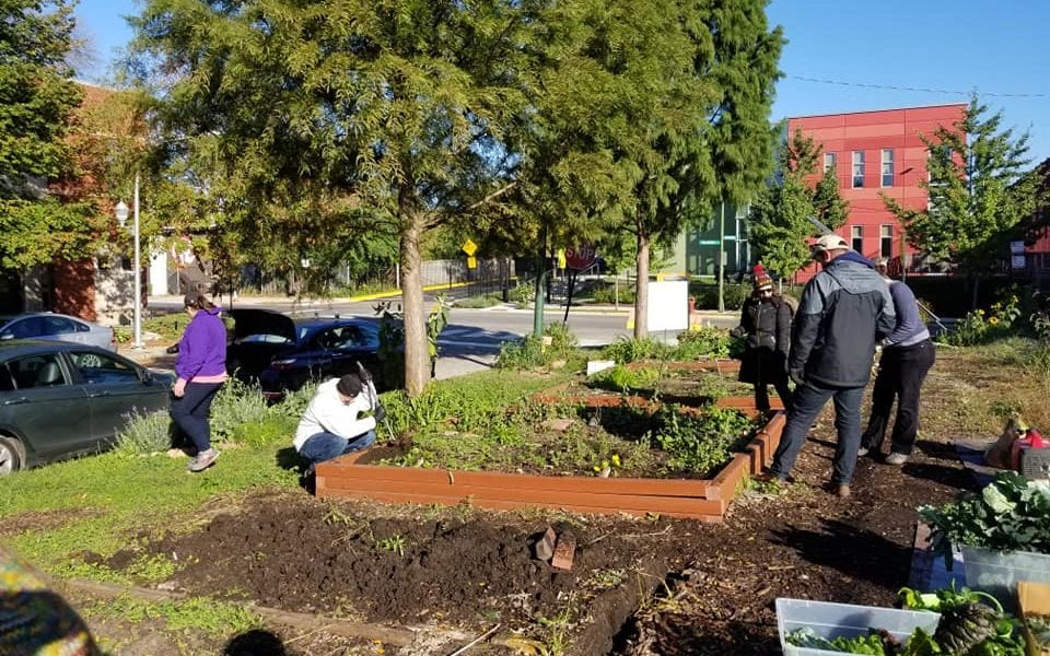 Volunteers work in the Bowmanville Gateway Garden