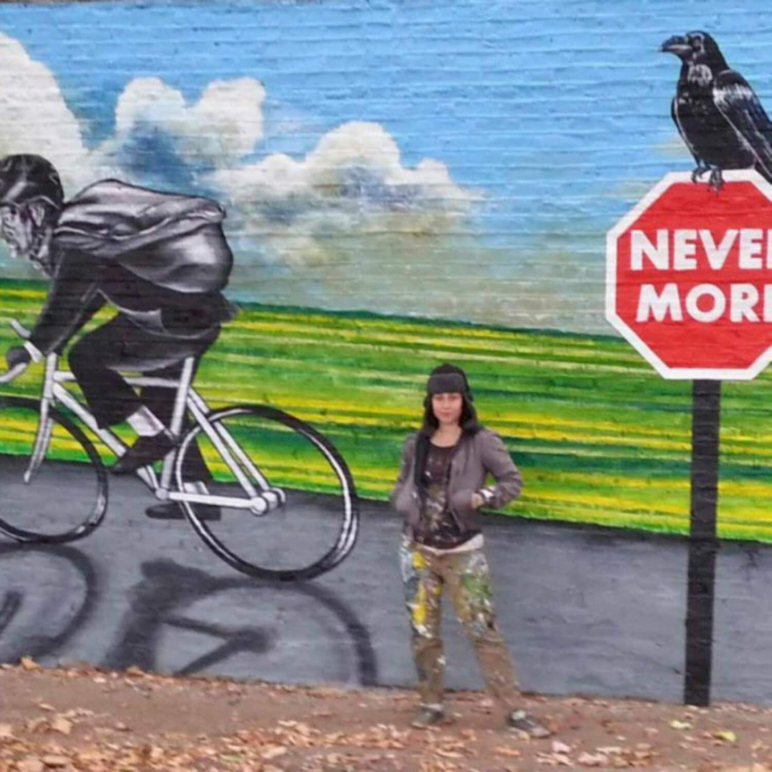 Yola Pilch in front of her mural