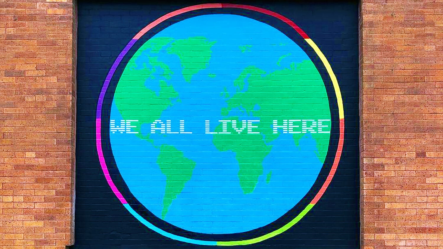 We All Live Here mural by Rich Alapack