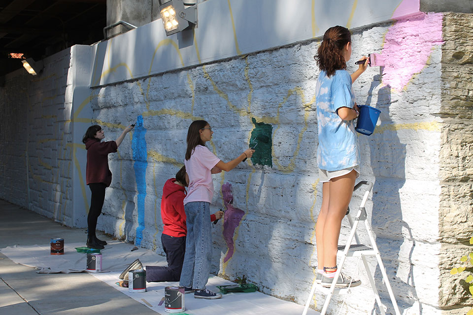 Students help paint For My Neighbors, With Love by Ponnopozz