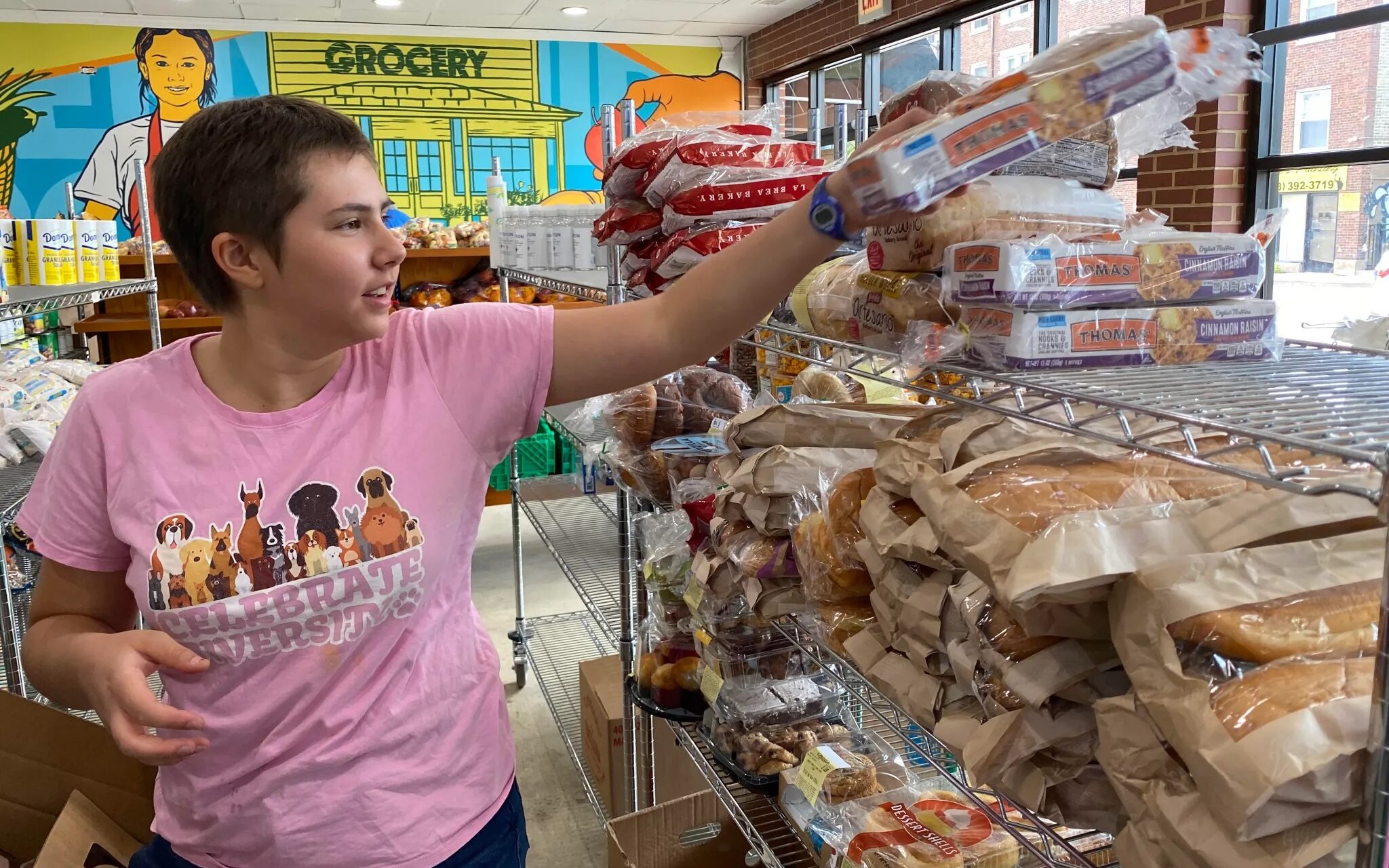A volunteer at The Friendship Center food pantry