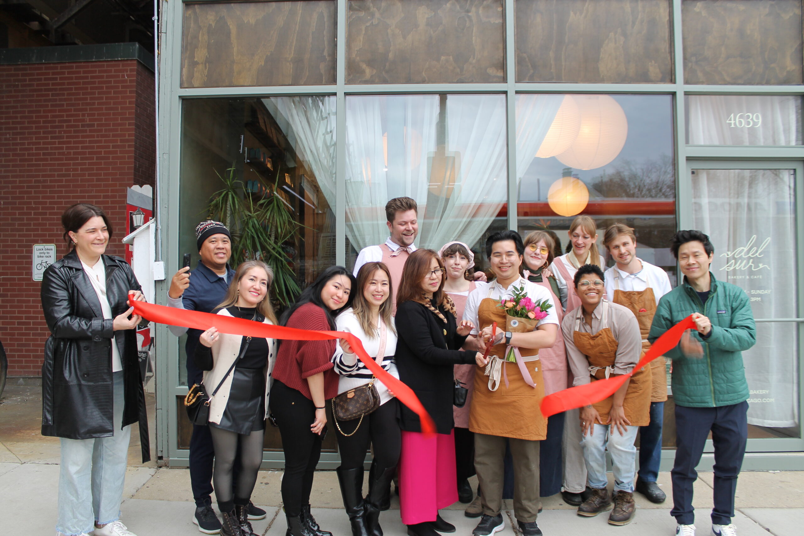 Del Sur team at ribbon cutting