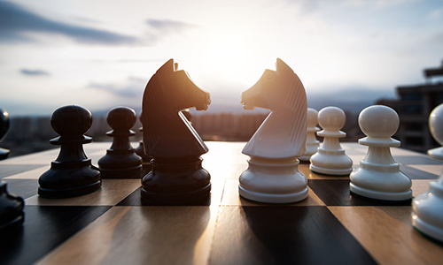 Knights face off on a chess board 