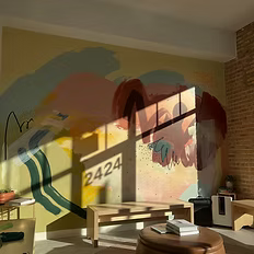 Forge Film Acting interior lounge with mural