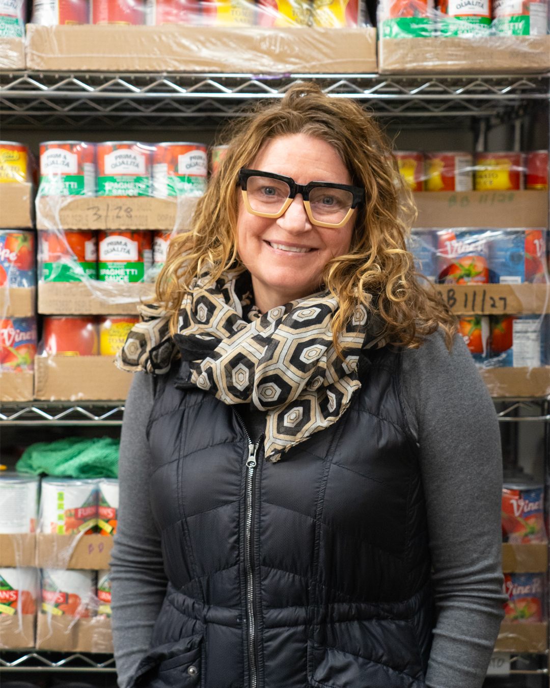 Margaret O'Conor poses for a photo in the Common Pantry facility 