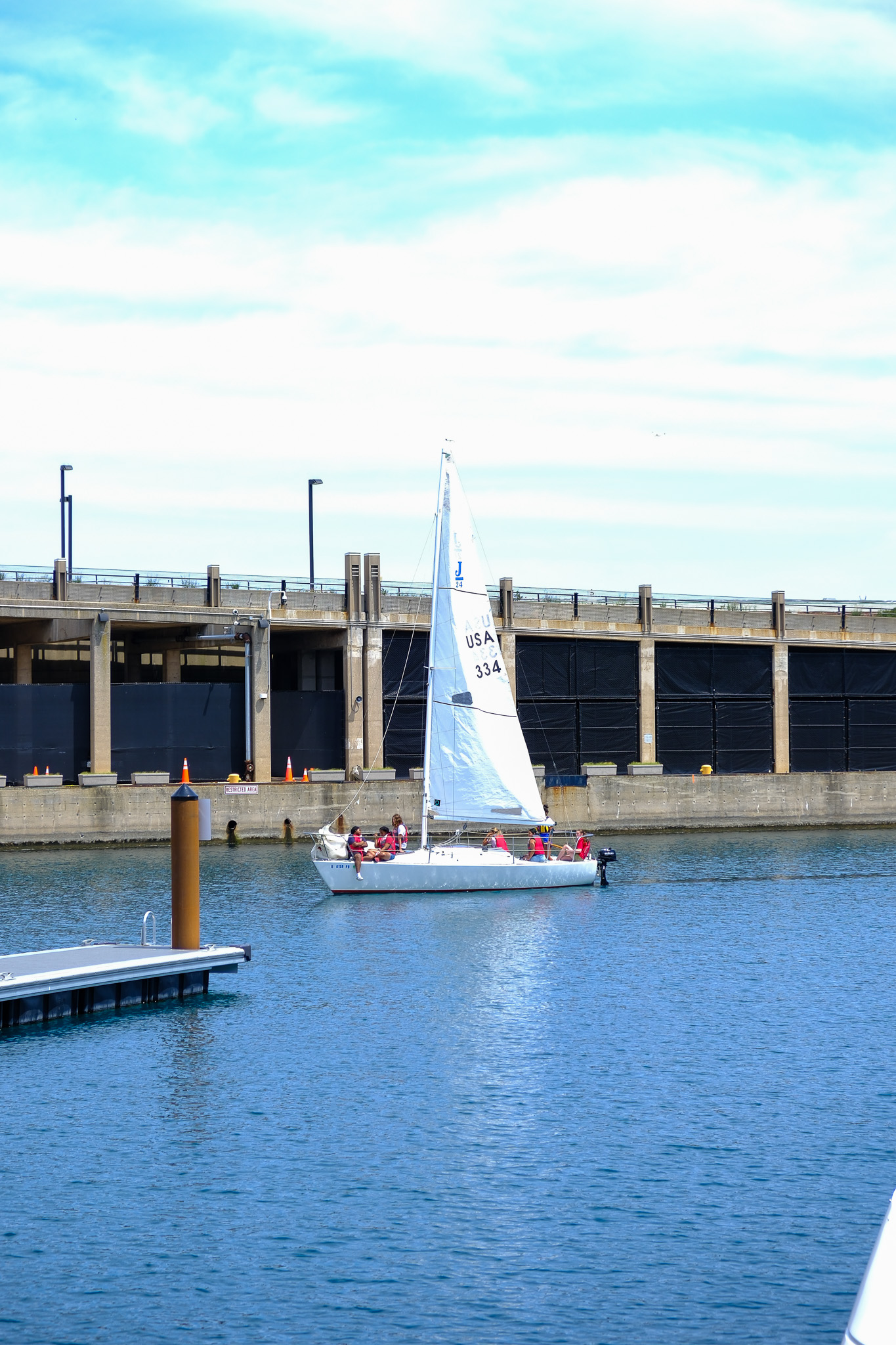 A sailboat in a Chicago harbor 