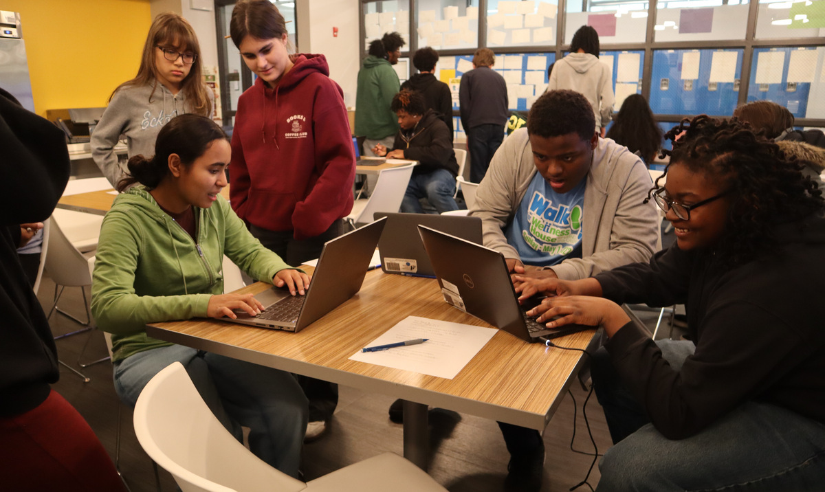DeVry University Advantage Academy students working on a project