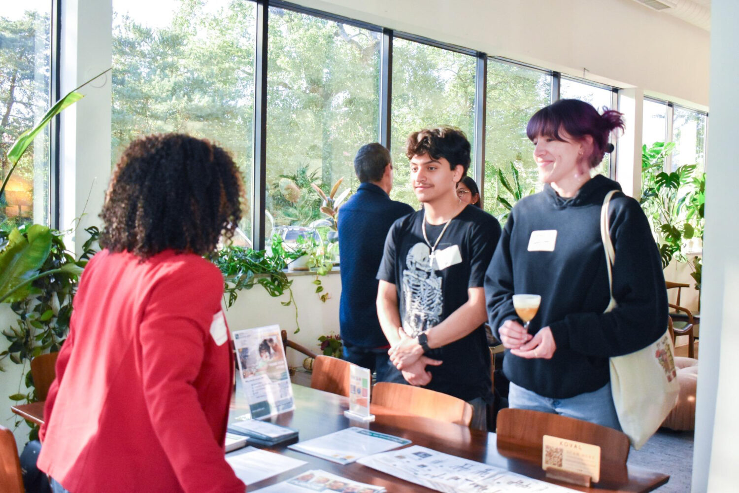 Job seekers check in at a previous Careers in Manufacturing Mixer at KOVAL Distillery