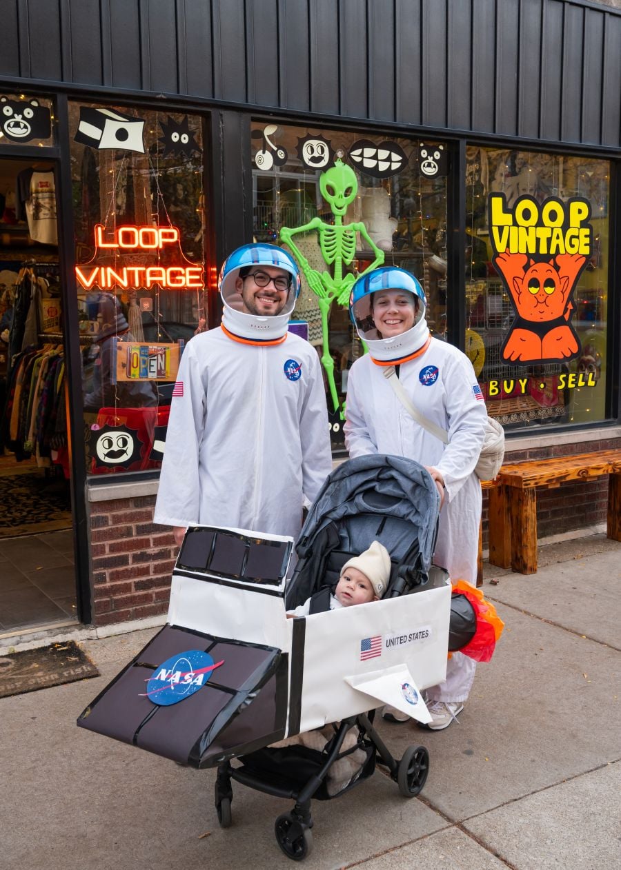 A family poses in costume outside of Loop Vintage 
